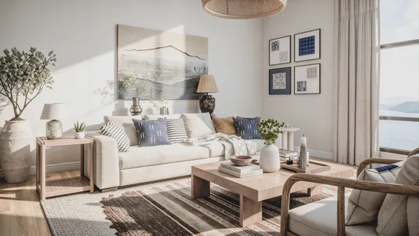 Living room rendering with a floated sectional, layered rug, wood coffee table and woven pendant